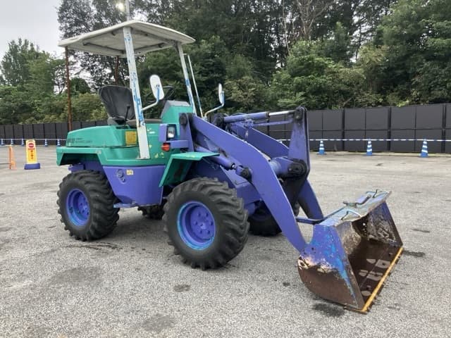 MINI WHEEL LOADER — Auction (lot 8461-70)