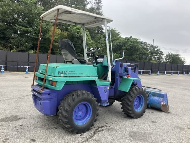 MINI WHEEL LOADER — Auction (lot 8461-70)