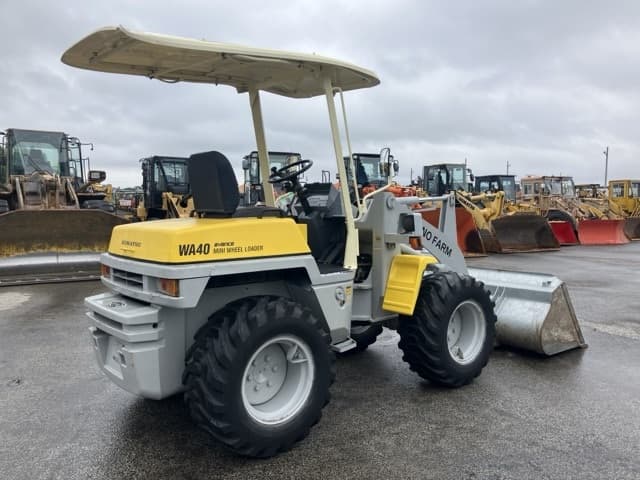 MINI WHEEL LOADER — Auction (lot 8461-93)