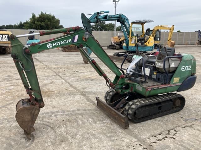 MINI EXCAVATOR — Auction (lot 8462-152)