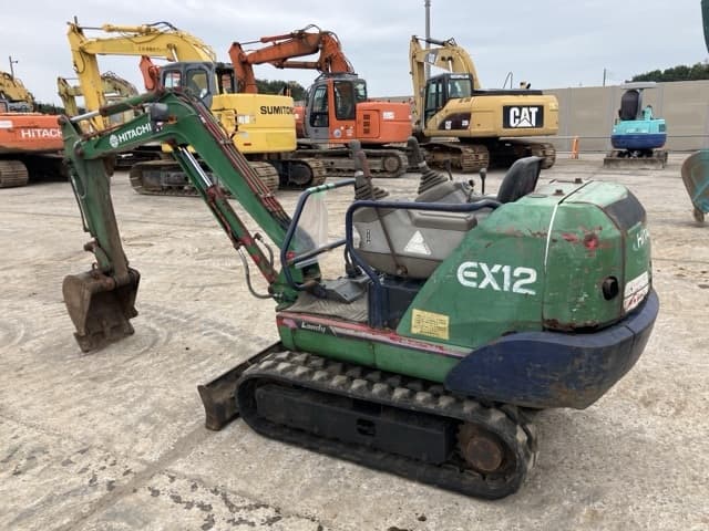 MINI EXCAVATOR — Auction (lot 8462-152)