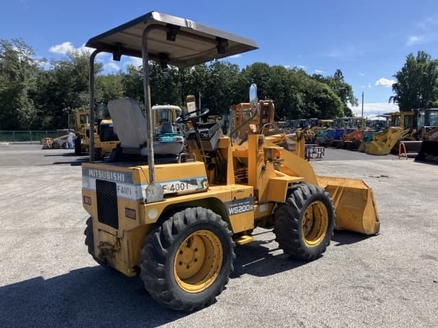 MINI WHEEL LOADER — Auction (lot 8462-67)