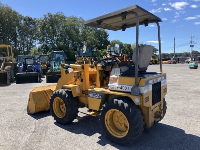 MINI WHEEL LOADER — Auction (lot 8462-67)