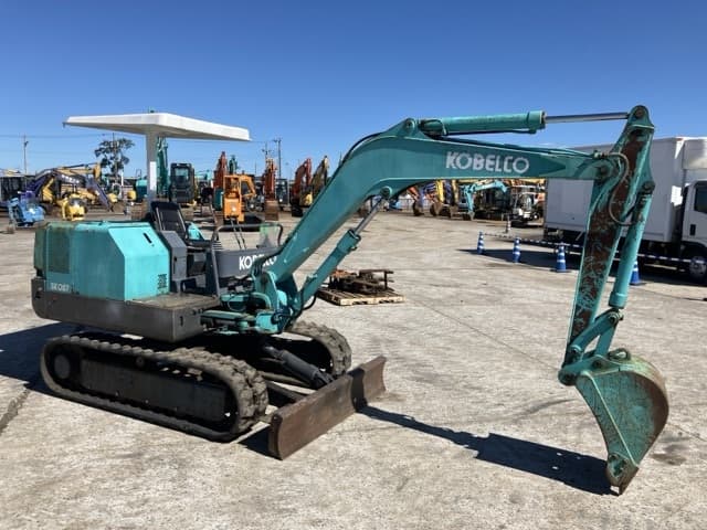 MINI EXCAVATOR — Auction (lot 8462-74)